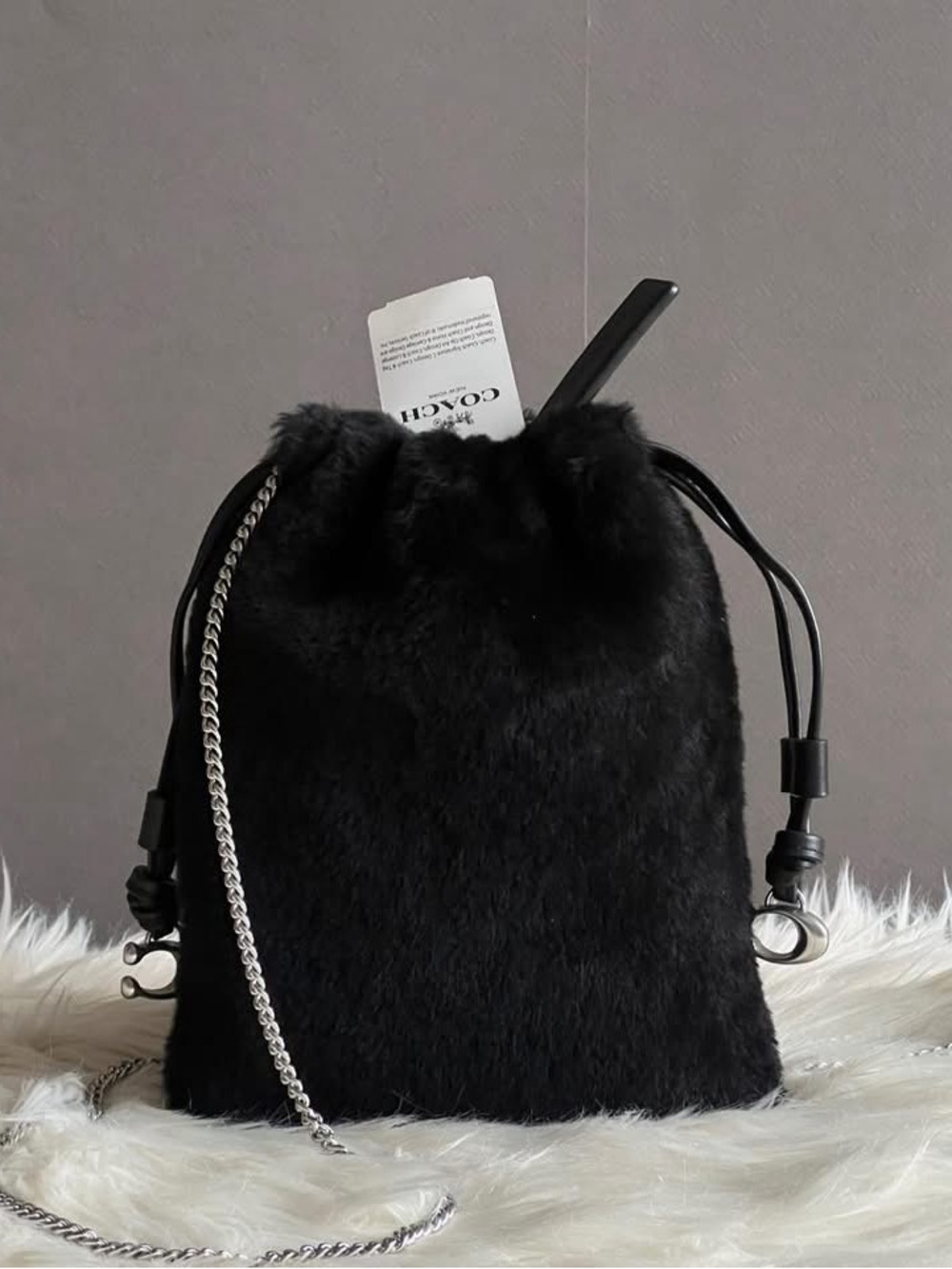 CE759 - Coach Drawstring Pouch in Shearling